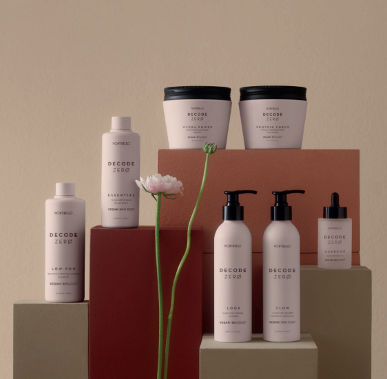 Display of six Decode Zero vegan haircare products — Low-Poo, Essential, Protein Force, Hydra Power, Flow and Supreme.