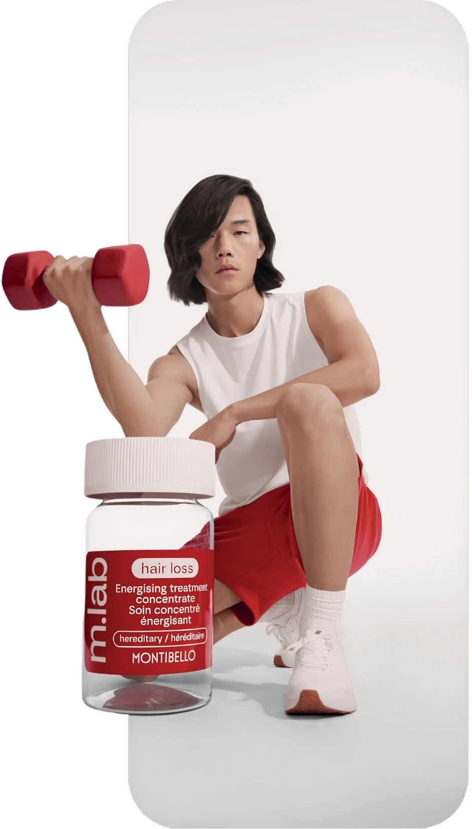Man lifts a red dumbbell next to a Montibello m.lab hair loss treatment bottle.
