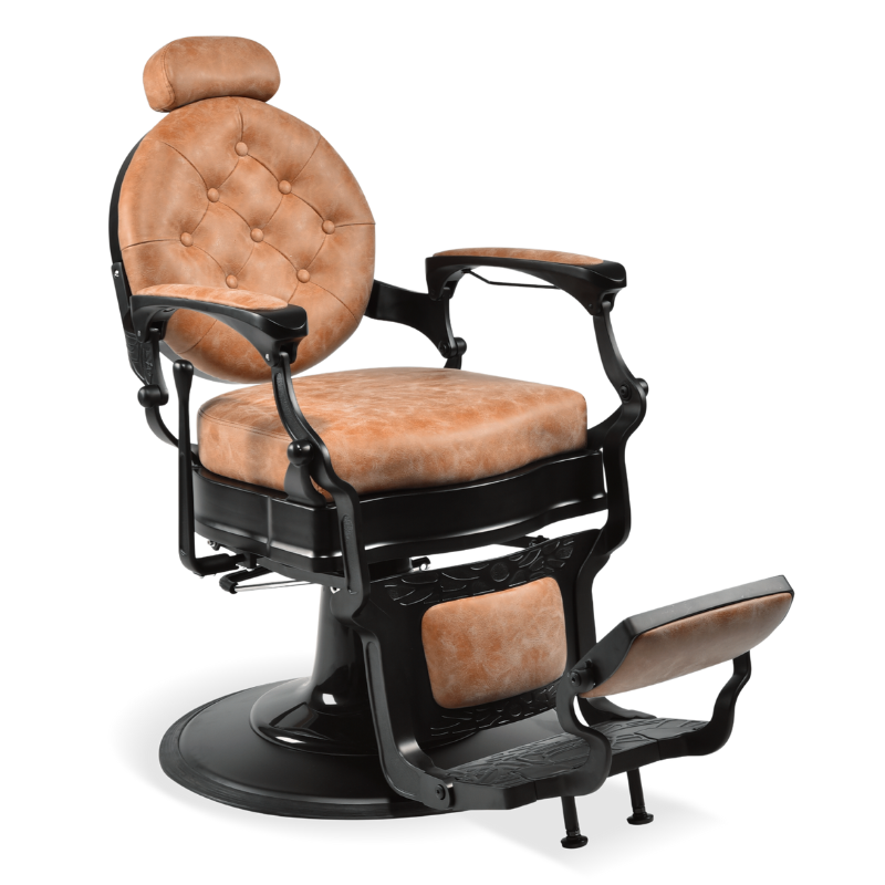 Lenny barber chair with tan buttoned upholstery on a black cast frame, with headrest and footrest