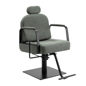 Sage green reclining brow chair with a headrest and footrest on a black square base