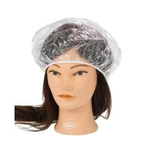 A clear disposable shower cap on a mannequin head